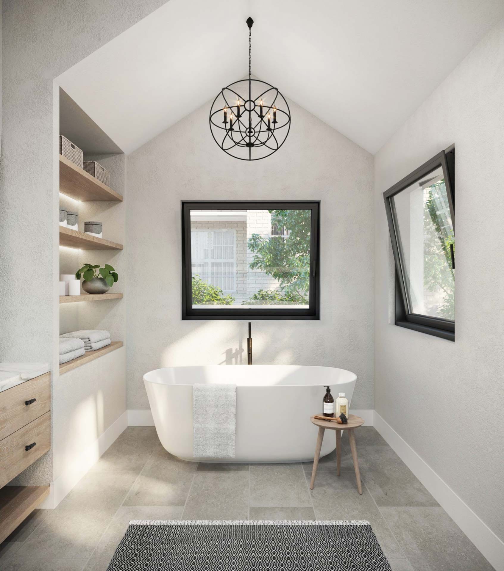 White bathroom with a freestanding tub and a black tilt-and-turn window in tilted position