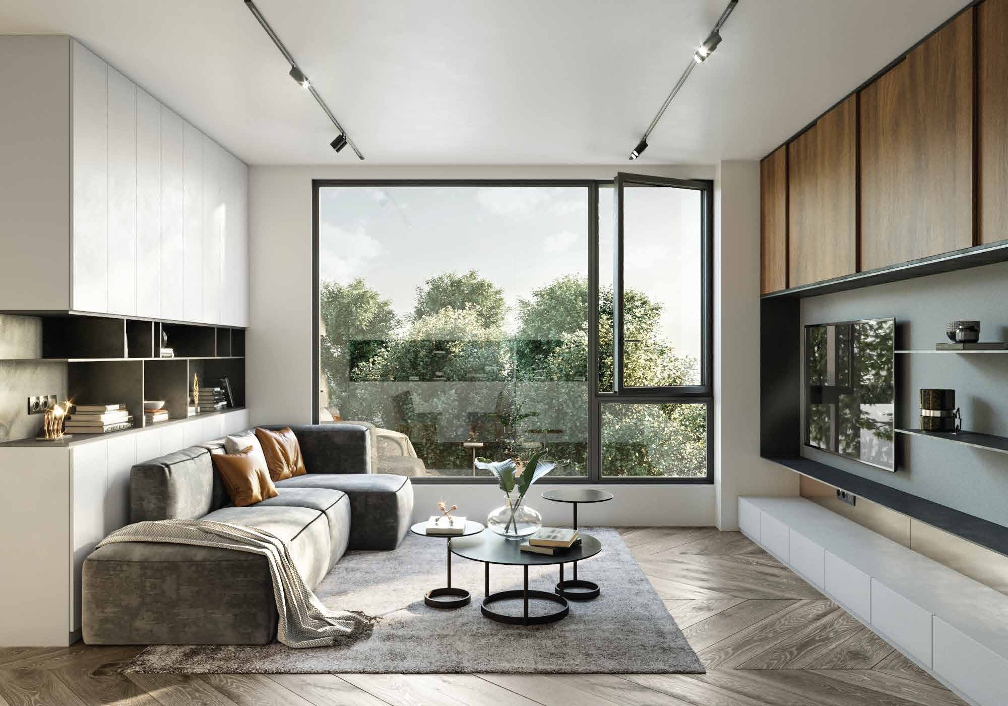 Modern living room with a black tilt-and-turn window ajar, opening onto greenery