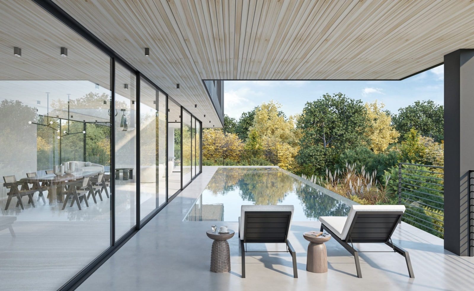 Slimline glass wall open onto an infinity pool and terrace